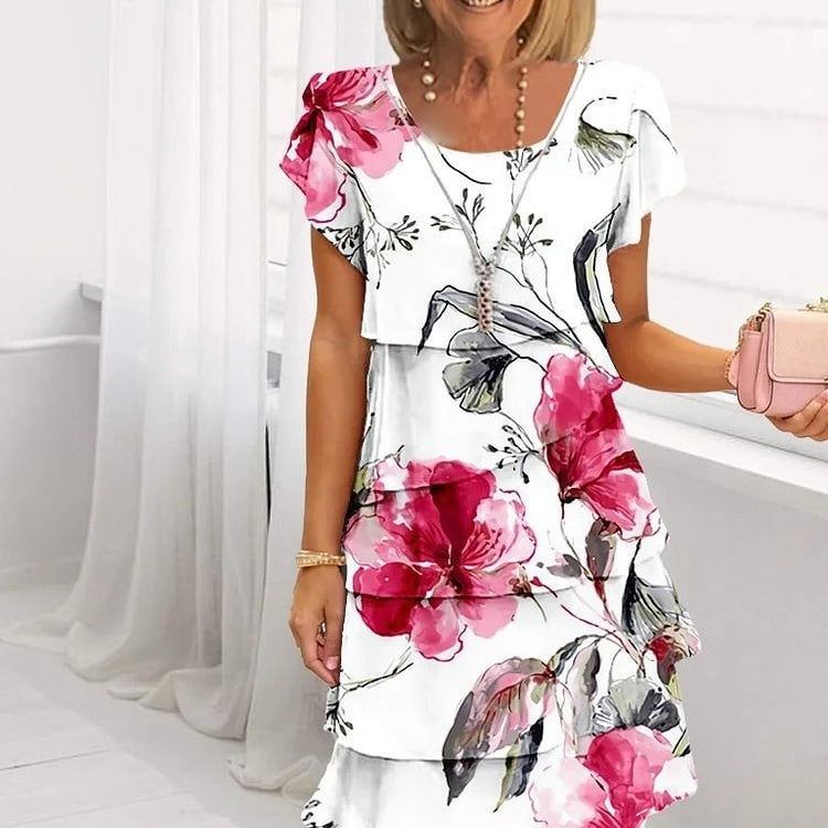 Abito elegante con motivo floreale
