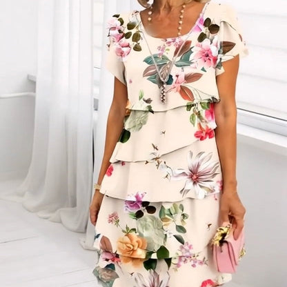 Abito elegante con motivo floreale